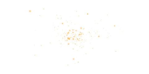 Gold sparks and stars glitter with a special light effect. Sparkles on a transparent background. Christmas abstract.