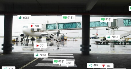 Parking commercial jet airliner connecting to green jet bridge at airport apron, with baggage carts