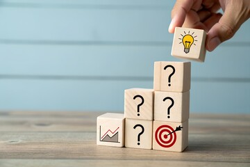 Hand placing lightbulb block on question mark blocks forming a staircase