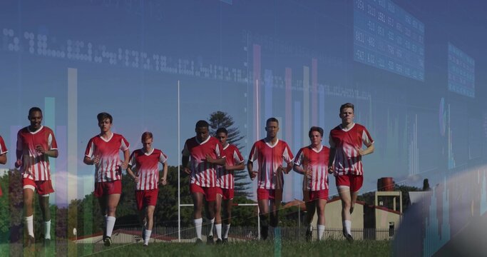 Soccer team running across sports field, with red jerseys, cleats, goal posts and data overlays - Powered by Adobe