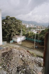 view of the city with abandoned building and debris