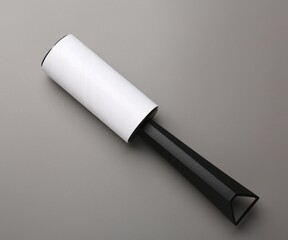 Lint roller on grey background, top view