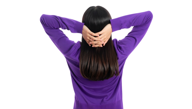 A person with dark hair wears a purple long-sleeved shirt, hands behind head