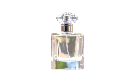 Clear perfume bottle with a faceted crystal-like stopper against a blurred green background