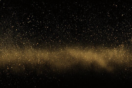 Black background with golden specks simulating a starry night or particles in motion