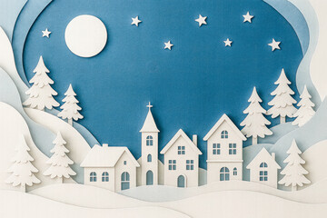 Horizontal illustration of peaceful snowy paper cut village under moonlight, featuring houses, church, stars, and pine trees &mdash; representing serenity, togetherness, and the Christmas spirit.