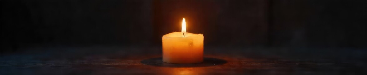 A single, flickering candle casts a warm, inviting glow in a darkened room, creating a serene and peaceful atmosphere  Perfect for relaxation, meditation, or spiritual themes ,  comfort,  texture