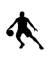 Silhouette of a basketball player dribbling the ball with intense focus and athletic movement