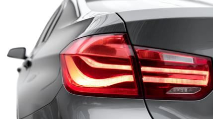 Close up of a modern car s illuminated red led taillight isolated on transparent background