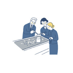 火葬後に骨上げをしている遺族