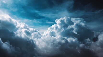 Obraz premium Dramatic sky filled with voluminous clouds illuminated by ambient light