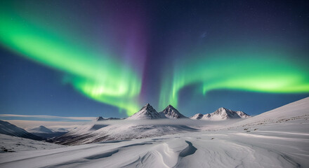 A breathtaking panorama of a winter mountain landscape with snow-covered peaks under a vast sky of cold clouds