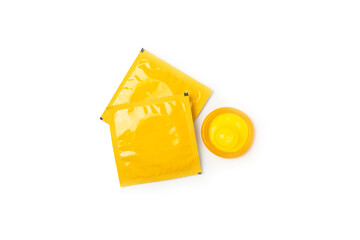 Condoms isolated on white background. Colorful fruit-colored condoms in packaging. Safe sex...
