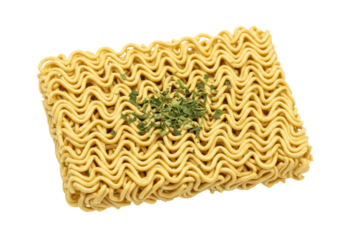 Isolated rectangle block of raw noodles with dried herbs on top for meal preparation