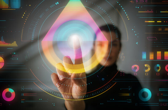 Woman interacting with futuristic colorful data interface in digital space