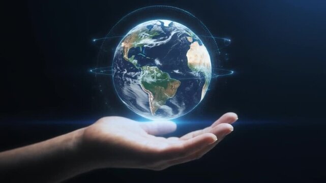 mano sosteniendo holograma de la tierra