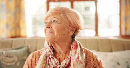 Happy, thinking and senior woman in home with hope, nostalgia and memory with vision. Smile,...