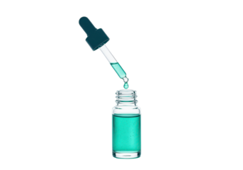 Isolated liquid dripping from pipette into glass vial, medical or wellness theme