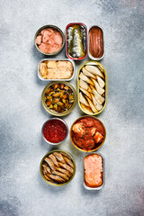 Fish and seafood preserves. Top view, vertical photo. Top view