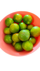 A bowl filled with vibrant green limes, showcasing their smooth skin and fresh appearance.