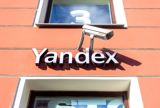 Yandex signboard on the building wall. Yandex LLC is a Russian technology company