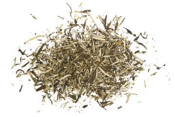 Yellow tea (Camellia sinensis ), dry leaves isolated on white background	