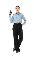 Obraz premium Young policewoman in uniform with gun on white background