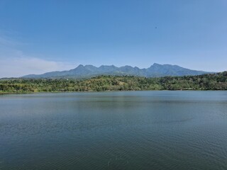 lake and mountains with clear blue sky in the summer