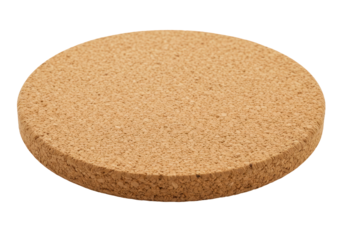 Isolated round cork coaster on a neutral surface for drink protection and table decor