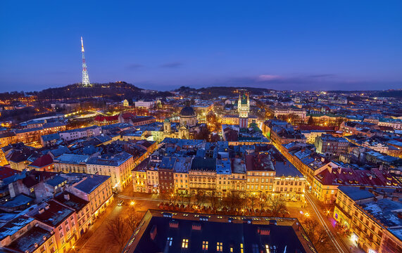 Breathtaking aerial view of Lviv's historic Old Town, Ukraine at twilight.