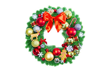 Christmas wreath with red and gold balls isolated on a white background.