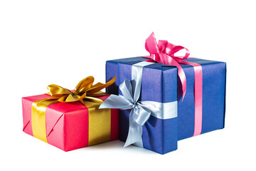 Elegant blue and pink gift boxes with bows isolated on white background.