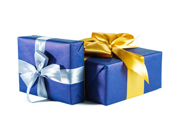 Elegant blue gift boxes with bows isolated on white background.