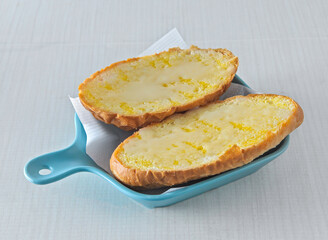 Crispy Butter Pig Toast or Golden Hong Kong Style 'Zhu Zai Bao' with Melted Butter Top View of hong kong food