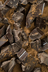 Chocolate pieces and crumbs background