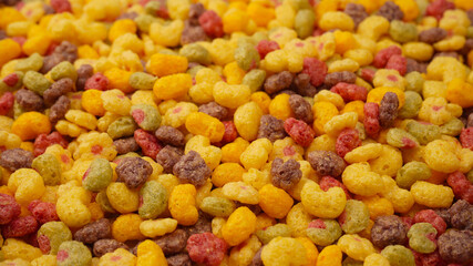 Sweet crunchy cornflakes as a background. Top view.