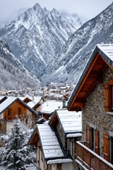 Snow-covered houses overlook a quiet village nestled in the mountains during winter