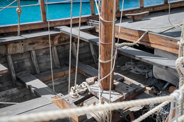 Wooden deck and mast details of Kyrenia Ship replica with ropes and rigging