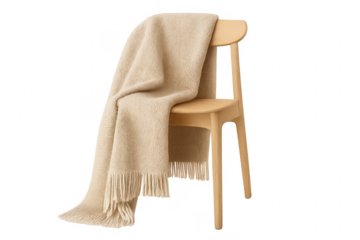 Wooden chair with cozy beige blanket drape