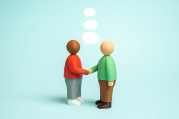 Two people shake hands and negotiate. Business. Communication and friendship. Partnership, contract signing, cooperation and trust in corporate relations. Teamwork, networking, leadership concepts.