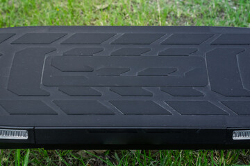 Electric scooter deck with geometric grip and LED lights close-up, electric scooter concept