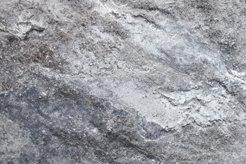 Naklejka premium Gray stone texture background natural rock surface detail