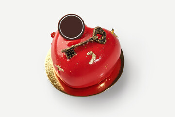 Heart-shaped red cake symbolizing love and affection with golden key decoration