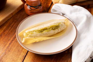 Tamales. Traditional food typical of Mexico and some Latin American countries. Corn dough wrapped in corn leaves. The tamales are steamed.