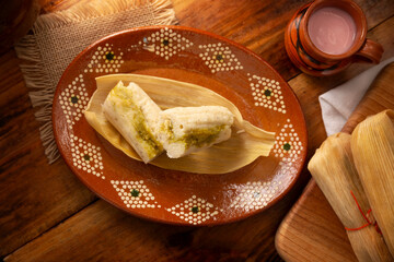 Tamales. Traditional food typical of Mexico and some Latin American countries. Corn dough wrapped in corn leaves. The tamales are steamed.