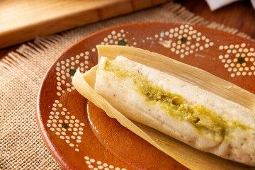 Tamales. Traditional food typical of Mexico and some Latin American countries. Corn dough wrapped in corn leaves. The tamales are steamed.