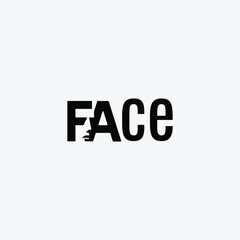 Black silhouette of a human face formed within the word F A C E on white background profile head