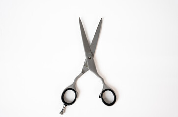 High-quality hairdressing scissors on minimal background. Suitable for salon, beauty, or barber tools themes. 