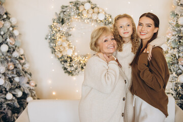 Three Generations Smiling Together at Christmas Celebration