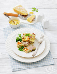 Cheesy ground meat vegetables casserole on a plate